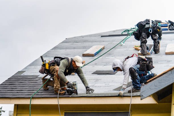Professional Roofing technician working in Bradley, OK